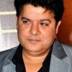 actor, director, producer Sajid khan in a black shirt with grey blazer