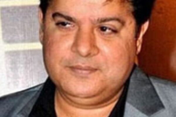 actor, director, producer Sajid khan in a black shirt with grey blazer